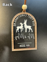 Load image into Gallery viewer, Back of the ornament, where the design is engraved and paint-filled in reverse